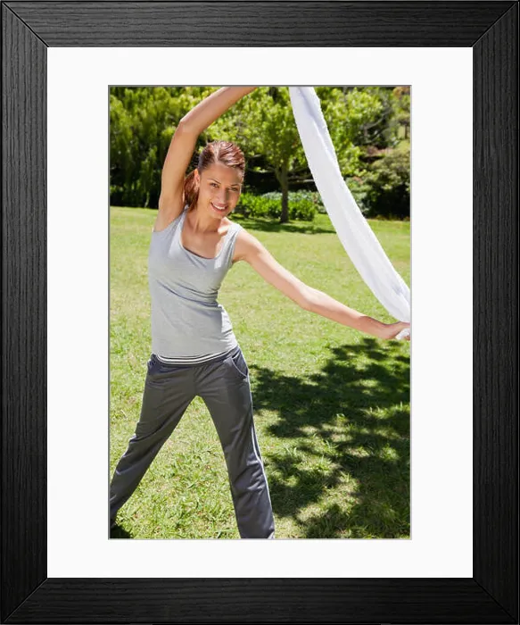 Framed Print : Woman stretching with her towel Framed Print : Woman stretching with her towel