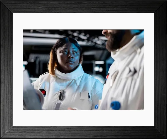 Framed Print : Close up of astronauts in spacecraft using laptop to track stars Framed Print : Close up of astronauts in spacecraft using laptop to track stars