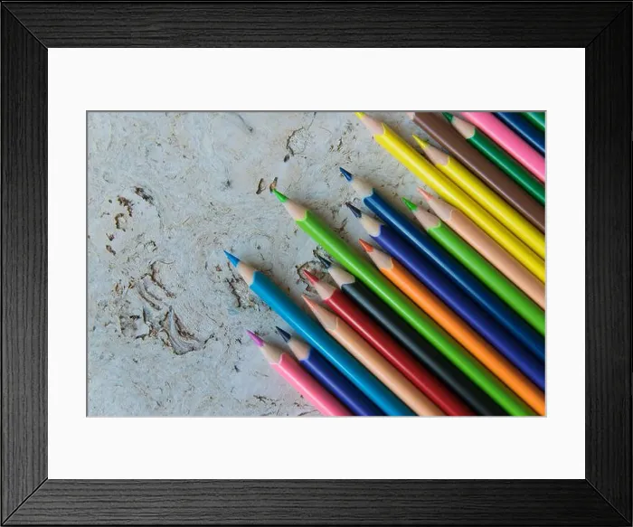 Framed Print : Much color pencils on the light natural cork background. Design concept. Place for text Framed Print : Much color pencils on the light natural cork background. Design concept. Place for text