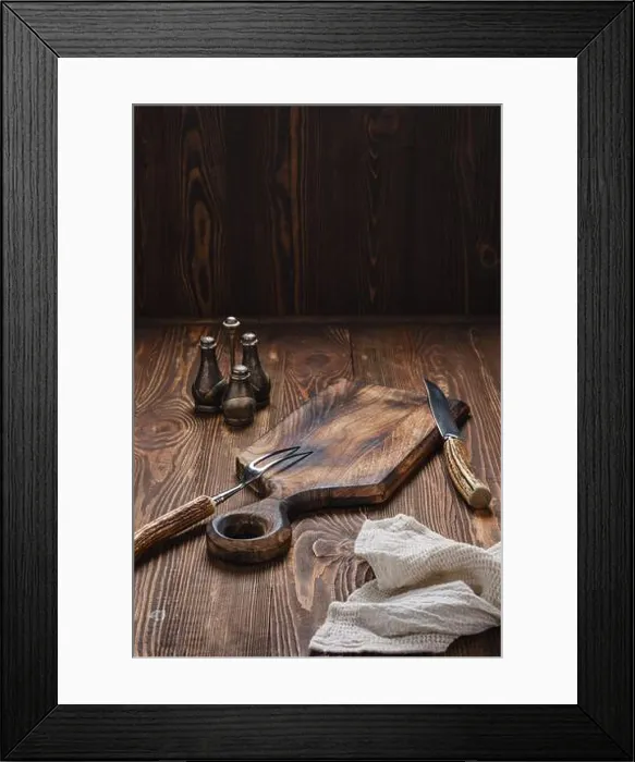 Framed Print : Empty wooden cutting board, fork and knife with for steak Framed Print : Empty wooden cutting board, fork and knife with for steak