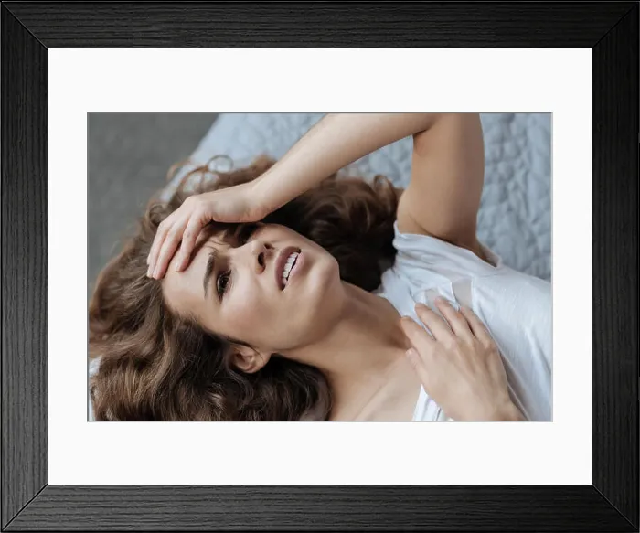 Framed Print : Cheerless moody woman having an awful headache Framed Print : Cheerless moody woman having an awful headache