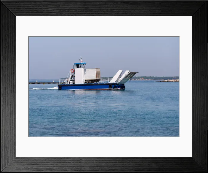 Framed Print : Small local ferry for one car or small truck connecting nearby islands with the mainland Framed Print : Small local ferry for one car or small truck connecting nearby islands with the mainland