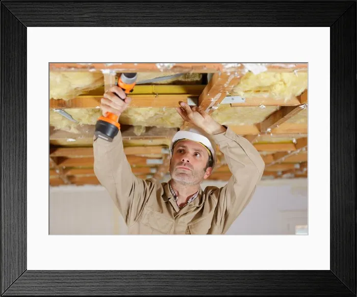 Framed Print : carpenter in a construction site Framed Print : carpenter in a construction site