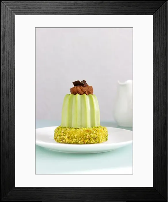Framed Print : Dessert Pistachio mousse with cherry brownie on pistachio dacquoise on white plate Framed Print : Dessert Pistachio mousse with cherry brownie on pistachio dacquoise on white plate
