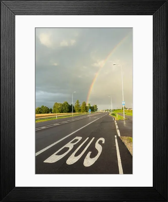 Framed Print : Road with bus lane marking under rainbow after rain in Estonia Framed Print : Road with bus lane marking under rainbow after rain in Estonia