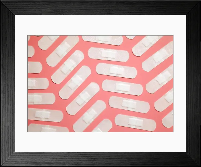 Framed Print : Many white adhesive band aids arranged on pink background. Transparent medical sticking plasters pattern Framed Print : Many white adhesive band aids arranged on pink background. Transparent medical sticking plasters pattern