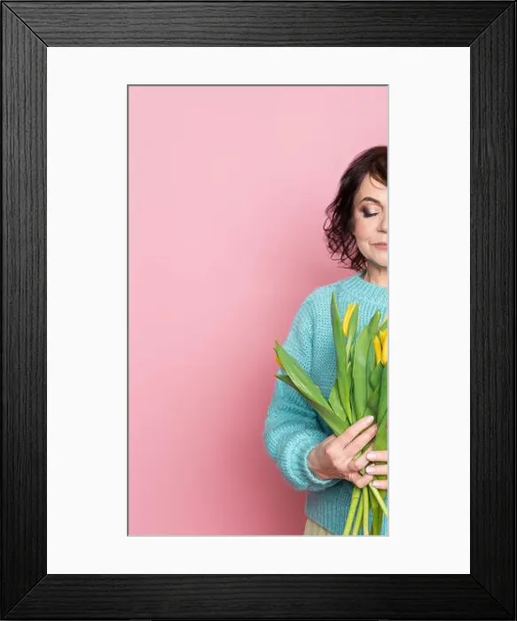 Framed Print : Beautiful old woman with professional smokey make-up and hairstyle holding tulip flowers on the pink background Framed Print : Beautiful old woman with professional smokey make-up and hairstyle holding tulip flowers on the pink background