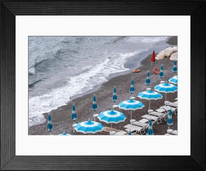 Framed Print : Rows of blue and white parasols and sunbeds on the beach at Atrani on the Amalfi Coast, Italy Framed Print : Rows of blue and white parasols and sunbeds on the beach at Atrani on the Amalfi Coast, Italy