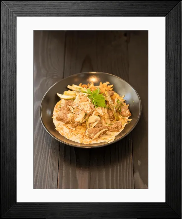 Framed Print : beef stroganoff in black plate of beef, mushroom and onion in cream sauce Framed Print : beef stroganoff in black plate of beef, mushroom and onion in cream sauce