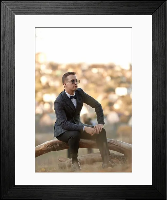 Framed Print : Handsome young man in classic checked suit and sunglasses outdoor