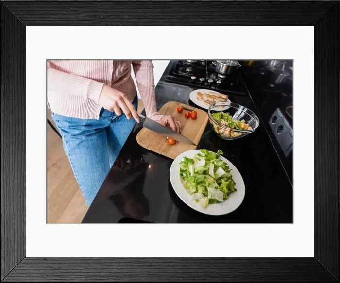Framed Print : cropped view of woman cutting cherry tomatoes near fried chicken fillet while preparing breakfast Framed Print : cropped view of woman cutting cherry tomatoes near fried chicken fillet while preparing breakfast
