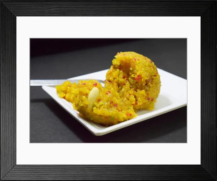 Framed Print : Indian Sweet Moti Choor Laddu in White Plate Top View on Black Background Close-Up Stock Photograph Image Framed Print : Indian Sweet Moti Choor Laddu in White Plate Top View on Black Background Close-Up Stock Photograph Image