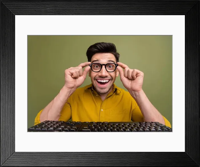 Framed Print : Photo of excited cheerful positive man wear yellow stylish clothes hold eyeglasses looking camera isolated on khaki Framed Print : Photo of excited cheerful positive man wear yellow stylish clothes hold eyeglasses looking camera isolated on khaki