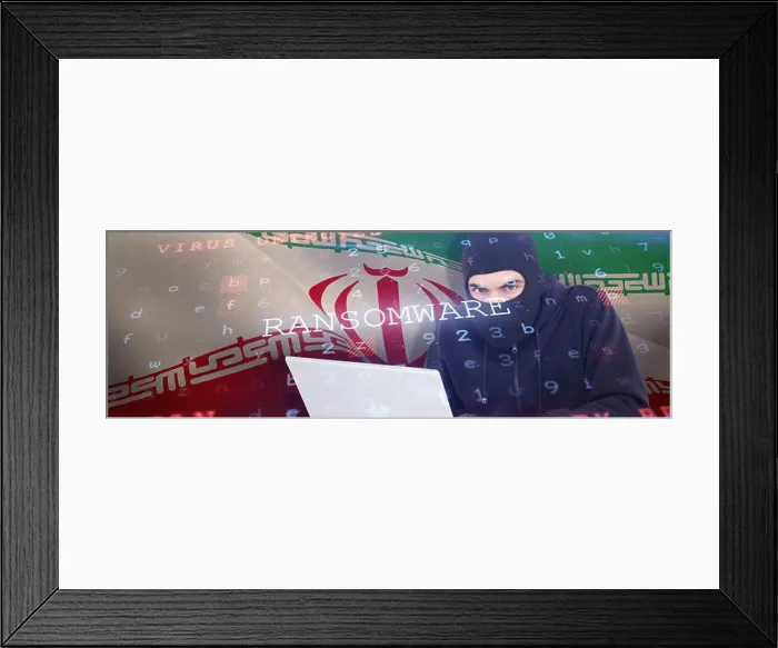Framed Print : Composite image of hacker in balaclava hacking a laptop Framed Print : Composite image of hacker in balaclava hacking a laptop