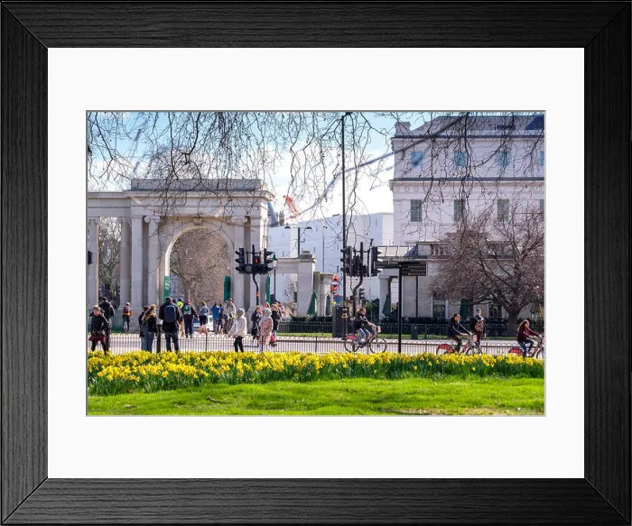Framed Print : LONDON, UK - March 21 2018: People enjoying a sunny day in London, riding bicycles or walking in Hyde Park Framed Print : LONDON, UK - March 21 2018: People enjoying a sunny day in London, riding bicycles or walking in Hyde Park