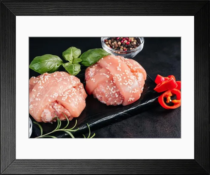Framed Print : Close-up of two chicken hamburgers with basil leaves Framed Print : Close-up of two chicken hamburgers with basil leaves