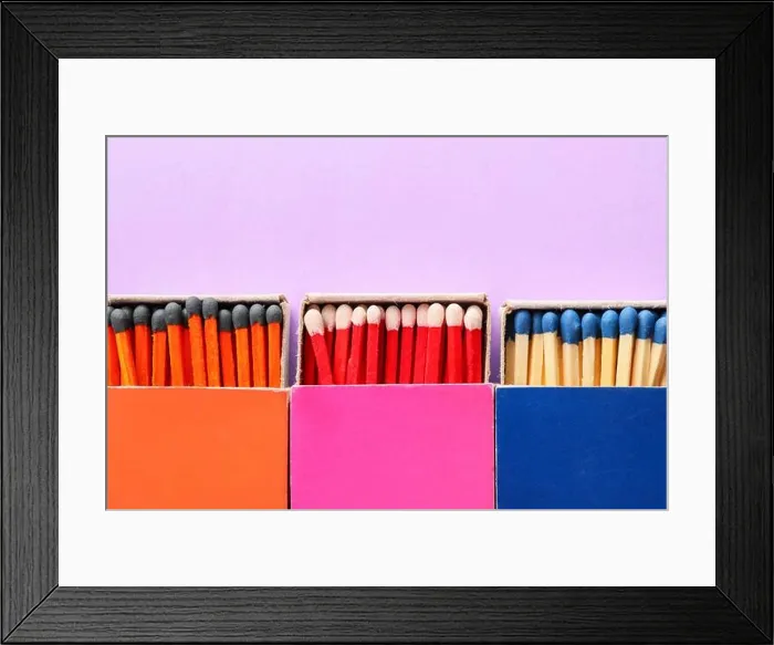 Framed Print : Different boxes with matches on color background, closeup Framed Print : Different boxes with matches on color background, closeup