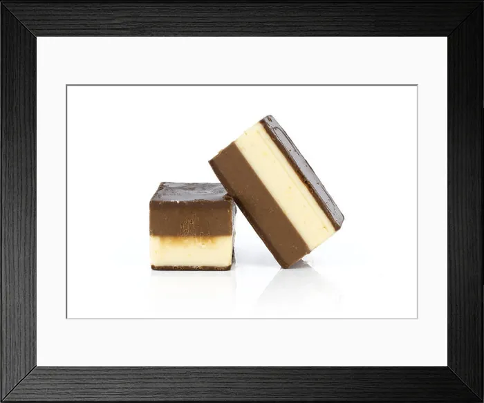 Framed Print : Group of two whole mellow two coloured nougat piece bars isolated on white background Framed Print : Group of two whole mellow two coloured nougat piece bars isolated on white background