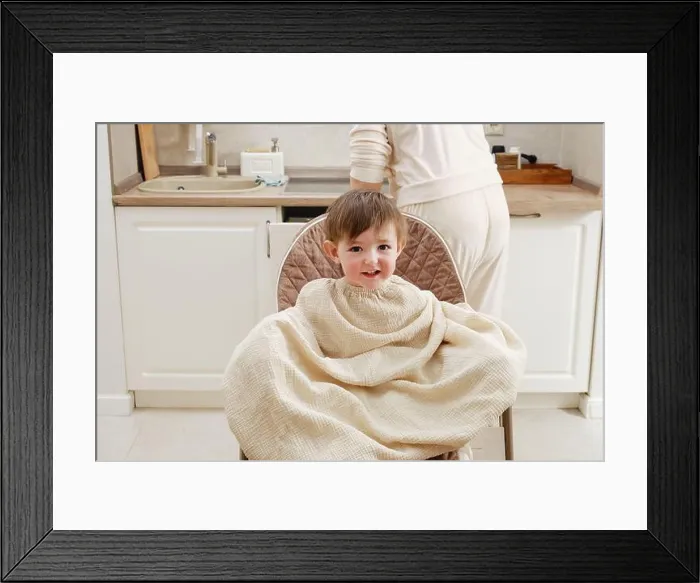 Framed Print : Mother woman cuts scissors toddler baby boy in home kitchen Framed Print : Mother woman cuts scissors toddler baby boy in home kitchen