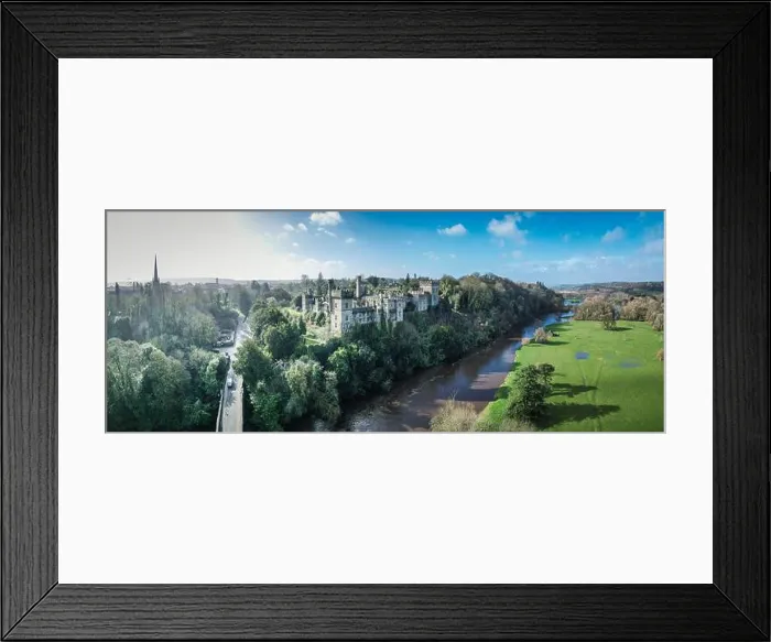 Framed Print : Aerial view of Lismore Castle, Ireland, showcasing its stunning Gothic architecture and scenic riverside location Framed Print : Aerial view of Lismore Castle, Ireland, showcasing its stunning Gothic architecture and scenic riverside location