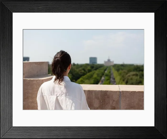 Framed Print : Woman toursit standing on building rooftop enjoying seeing panoramic view of metropolitan city during summer vacantion Framed Print : Woman toursit standing on building rooftop enjoying seeing panoramic view of metropolitan city during summer vacantion