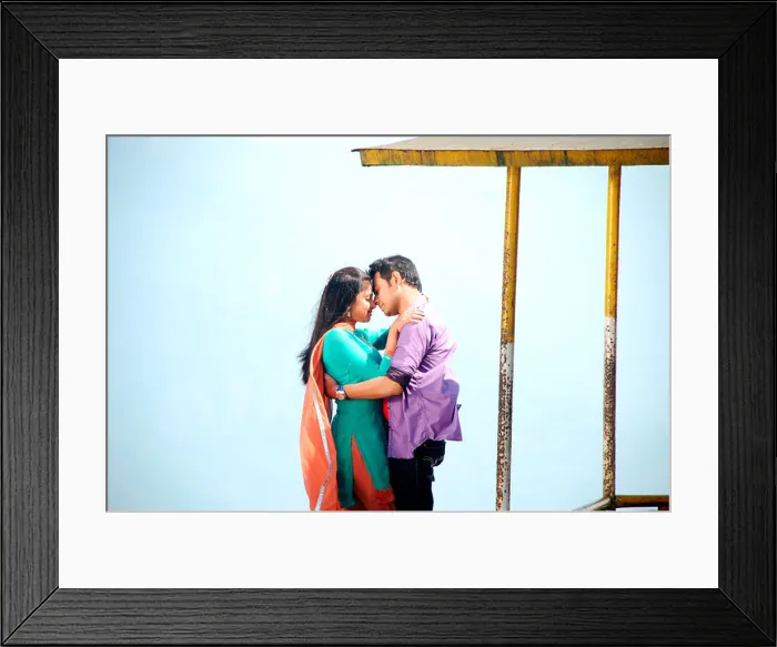 Framed Print : Romantic pose by an Indian boy and a girl Framed Print : Romantic pose by an Indian boy and a girl