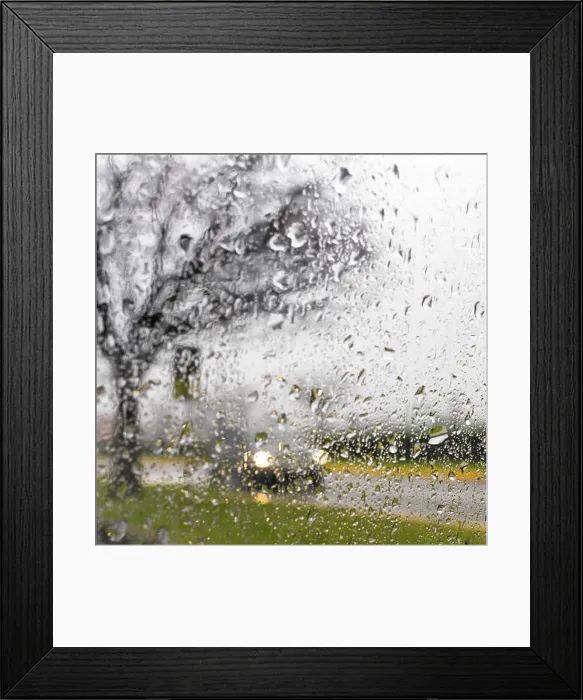 Framed Print : Blurry car silhouette seen through water drops on the car windshield Framed Print : Blurry car silhouette seen through water drops on the car windshield
