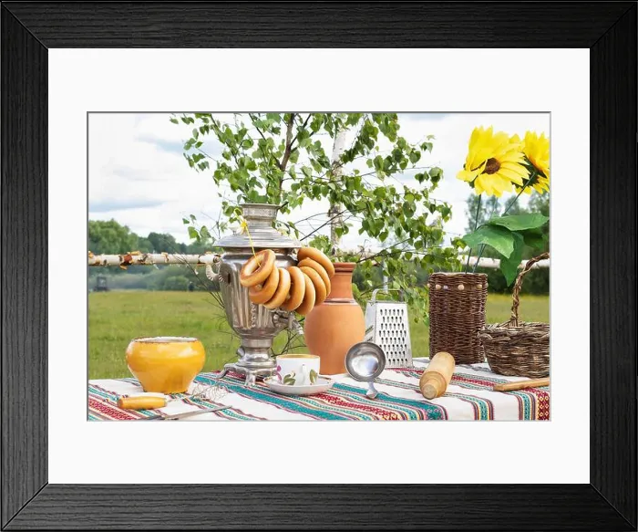 Framed Print : Old Russian rustic table with samovar, bagels and other kitchen utensils outdoors in the garden Framed Print : Old Russian rustic table with samovar, bagels and other kitchen utensils outdoors in the garden