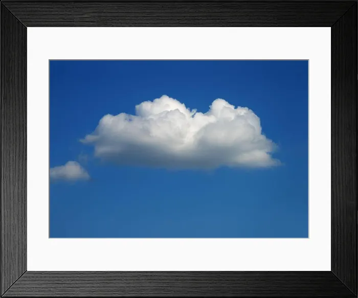 Framed Print : one single white cumulus cloud in the blue sky in summer Framed Print : one single white cumulus cloud in the blue sky in summer