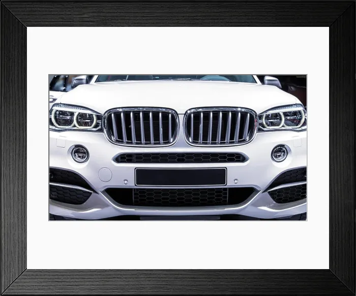 Framed Print : View of the front of a modern SUV of the brand BMW Framed Print : View of the front of a modern SUV of the brand BMW
