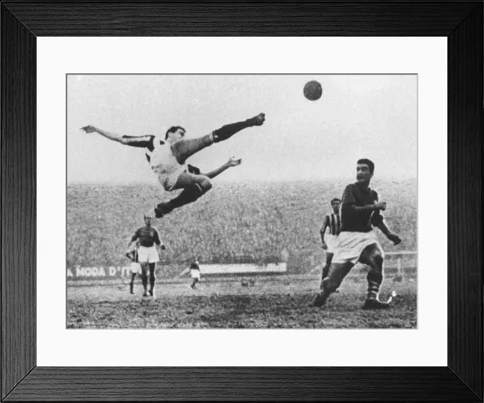 Framed Print : Italian footballer Carlo Parola of Juventus FC performs a bicycle kick in Florence during a League match against AC Framed Print : Italian footballer Carlo Parola of Juventus FC performs a bicycle kick in Florence during a League match against AC