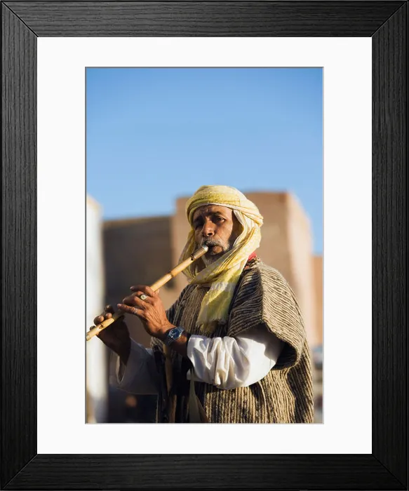 Framed Print : Man Playing Flute In Essaouira, Morocco Framed Print : Man Playing Flute In Essaouira, Morocco