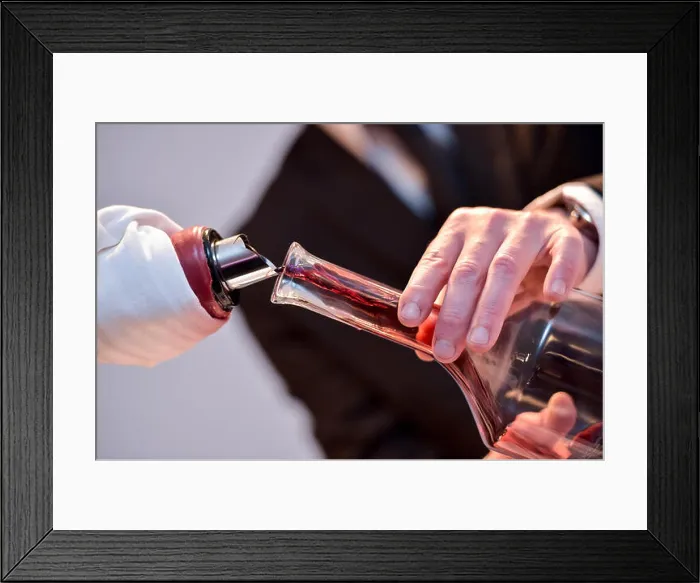 Framed Print : Decanting red wine - transferring wine to a carafe Framed Print : Decanting red wine - transferring wine to a carafe