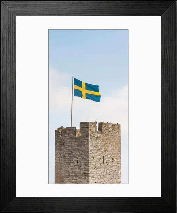 Framed Print : Tower of the Visby city wall and the Swedish flag, Gotland, Sweden. Scandinavia Framed Print : Tower of the Visby city wall and the Swedish flag, Gotland, Sweden. Scandinavia