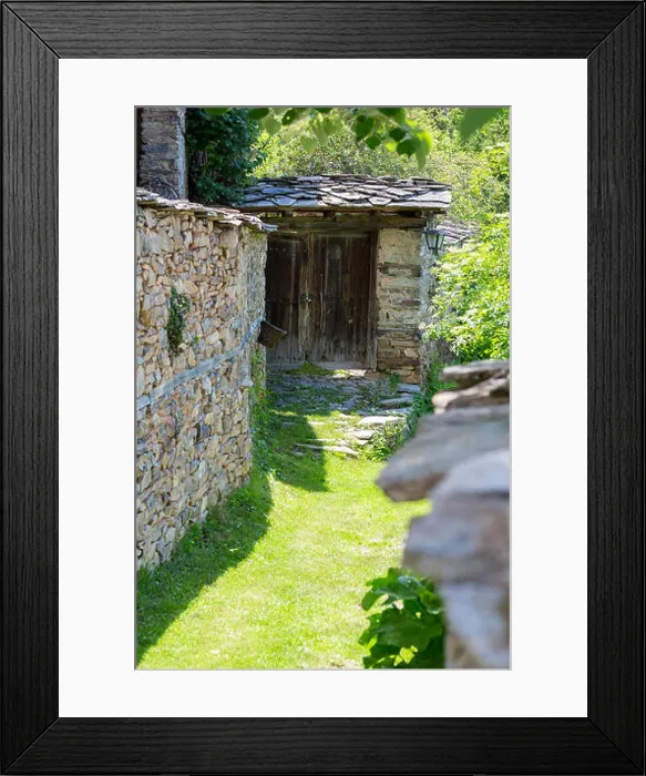 Framed Print : Narrow street covered with grass between old stone walls Framed Print : Narrow street covered with grass between old stone walls