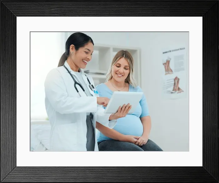 Framed Print : Lets check that precious heartbeat and movements. a doctor during a consultation with a pregnant patient in a clinic Framed Print : Lets check that precious heartbeat and movements. a doctor during a consultation with a pregnant patient in a clinic