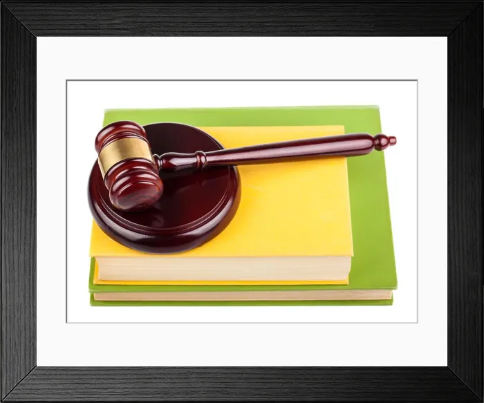 Framed Print : Wooden gavel on books Framed Print : Wooden gavel on books