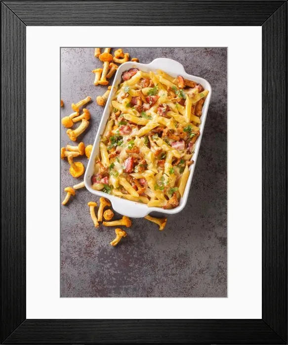Framed Print : Gratin prepared from penne pasta with chanterelle mushrooms Framed Print : Gratin prepared from penne pasta with chanterelle mushrooms