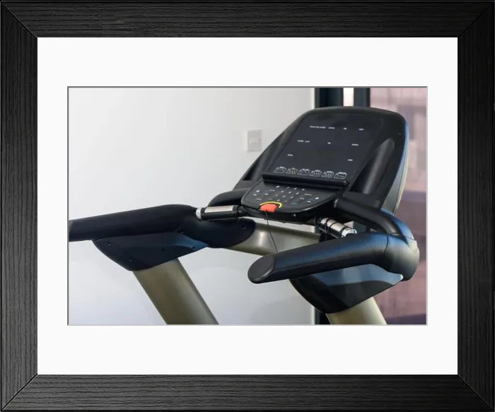Framed Print : Treadmill and Cross Trainers Side by Side in Gym Framed Print : Treadmill and Cross Trainers Side by Side in Gym