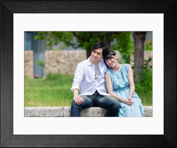 Framed Print : Couple spending time in park Framed Print : Couple spending time in park