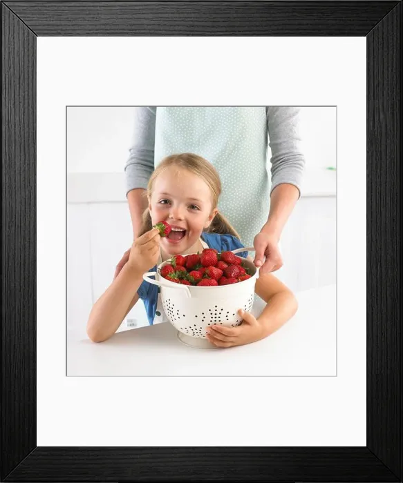 Framed Print : Girl and large colander of strawberries, 5 years Framed Print : Girl and large colander of strawberries, 5 years