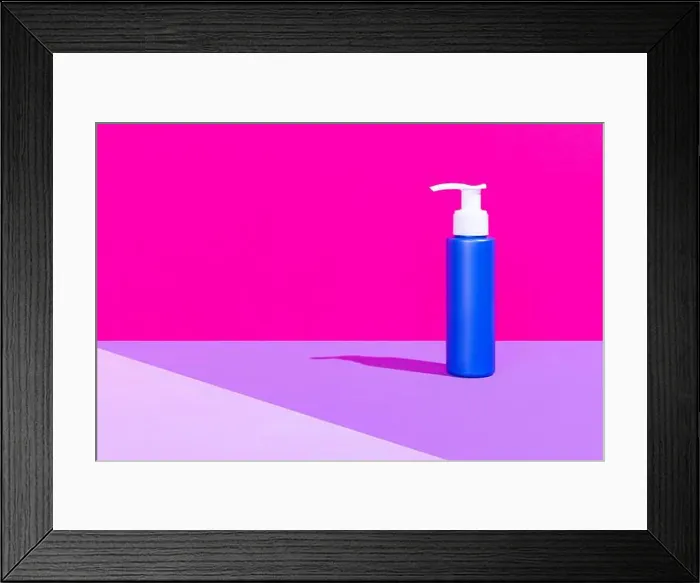Framed Print : One blue pump bottle for cosmetics product, cream, lotion without logos standing isolated over magenta pink background Framed Print : One blue pump bottle for cosmetics product, cream, lotion without logos standing isolated over magenta pink background