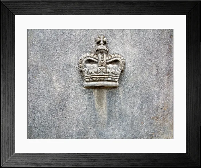 Framed Print : A Royal Crown motif cast in lead on the side of a lead planter Framed Print : A Royal Crown motif cast in lead on the side of a lead planter