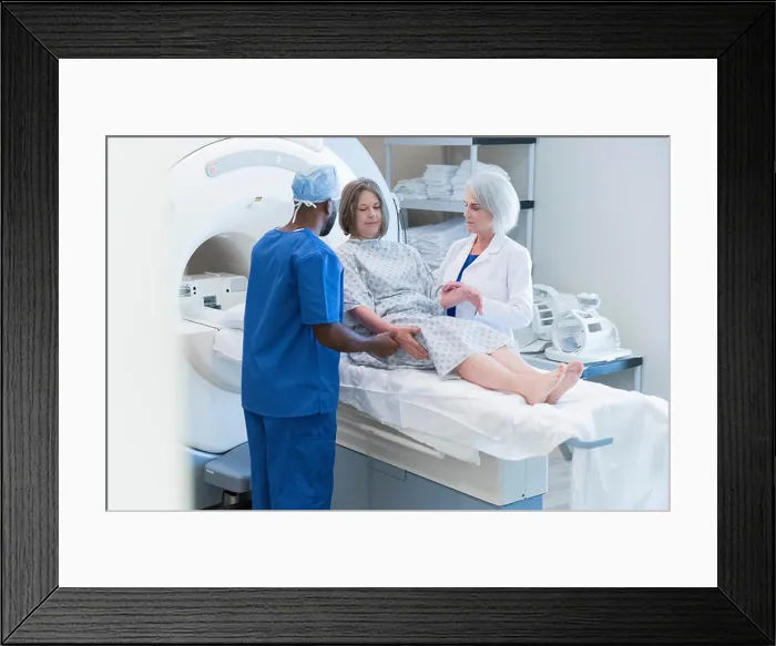 Framed Print : Doctor and nurse helping patient at scanner Framed Print : Doctor and nurse helping patient at scanner