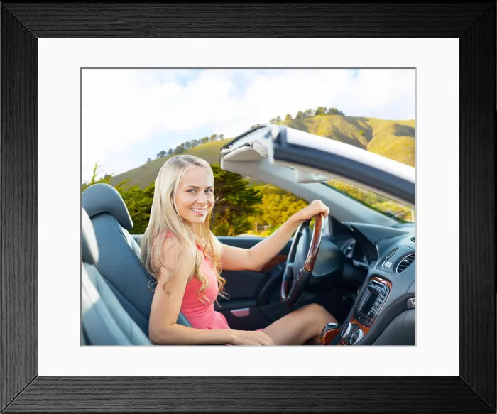 Framed Print : happy woman driving convertible car at big sur Framed Print : happy woman driving convertible car at big sur