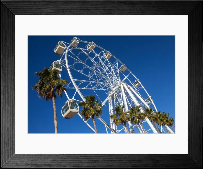 Framed Print : A view of the Mirador Princess ferris wheel in the beautiful coastal town of Benalmadena, Spain Framed Print : A view of the Mirador Princess ferris wheel in the beautiful coastal town of Benalmadena, Spain