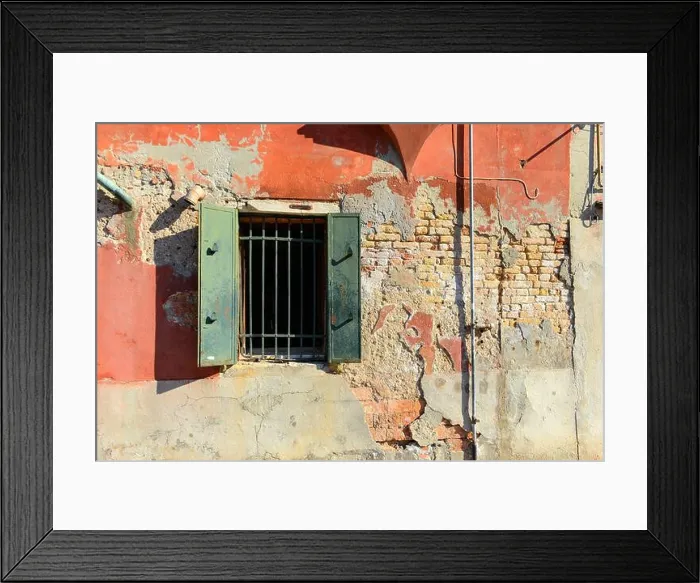 Framed Print : Green window on orange old house wall Cracks in concrete visible red bricks in Venice, Italy Framed Print : Green window on orange old house wall Cracks in concrete visible red bricks in Venice, Italy