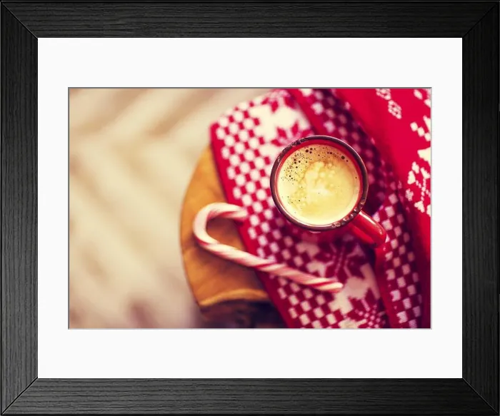 Framed Print : Christmas red and white background with mug of coffee and candy cane Framed Print : Christmas red and white background with mug of coffee and candy cane