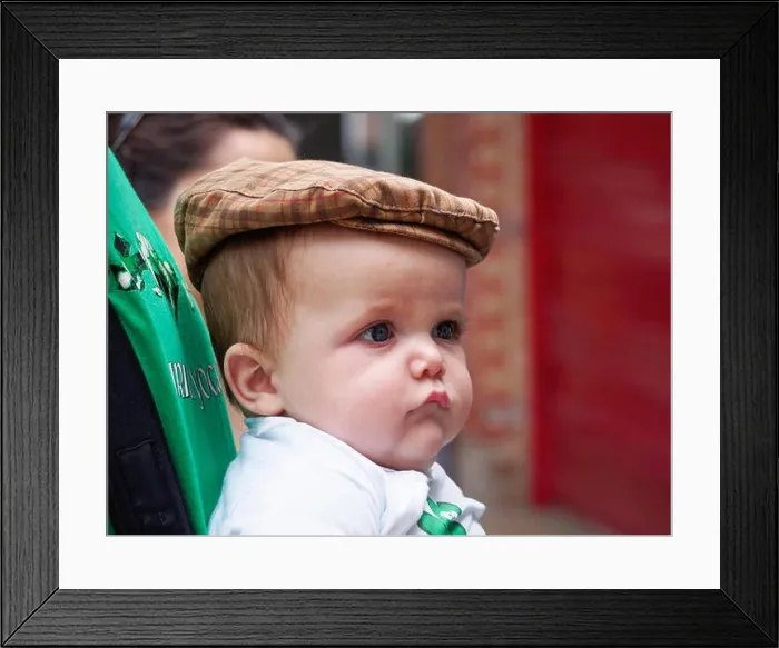 Framed Print : A cute baby boy with chubby cheeks wearing a flat tweed cap Framed Print : A cute baby boy with chubby cheeks wearing a flat tweed cap