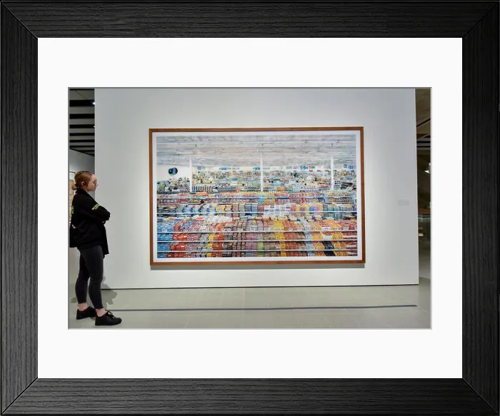 Framed Print : London, UK. 24 January 2018. A staff member views '99 Cent' Framed Print : London, UK. 24 January 2018. A staff member views '99 Cent'
